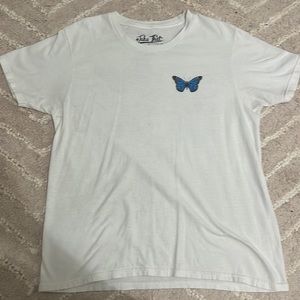 2 white butterfly tees